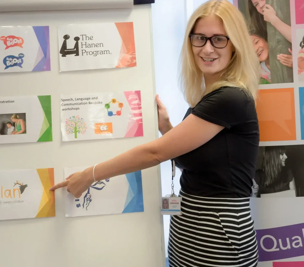 Teacher pointing at a board